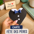 Une carte vidéo colorée pour la fête des pères, affichant des photos et un message personnalisé.