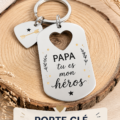 Un porte-clé personnalisé en cuir avec le prénom d'un papa gravé dessus.