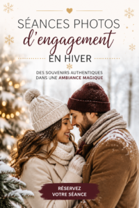 Un couple amoureux posant joyeusement dans un paysage enneigé durant une séance photo d'engagement en hiver.