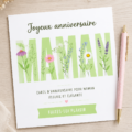 Carte d'anniversaire florale faite main pour une mère, sur un fond coloré.